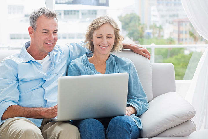 couple approaching the "closing in stage" checks their finances and becomes more conservative as they near their retirement date.